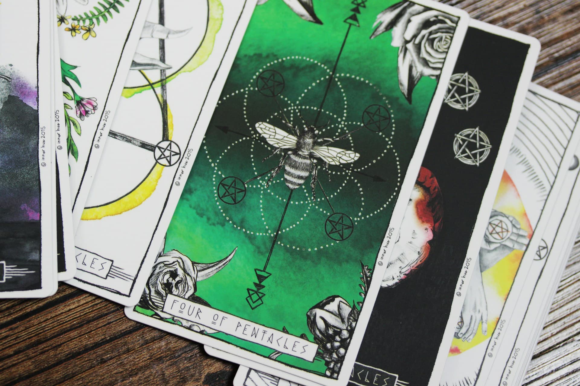 A set of colourful tarot cards, representing the transformative qualities of knowledge